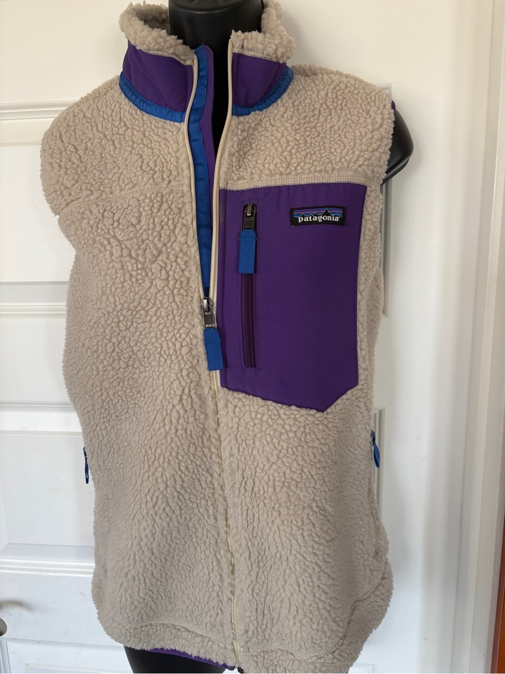 Patagonia women’s Cream Sherpa Vest with Purple Chest Pocket